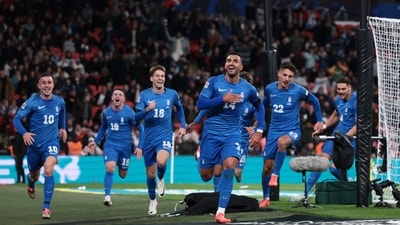 Greece's Vangelis Pavlidis celebrates scoring their second goal with teammate. (Action Images via Reuters)
