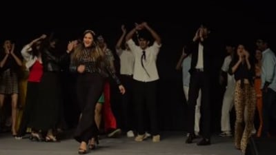 A teacher's confident ramp walk at NMIS wowed students and went viral. (Instagram/kavya_chaudhary_30)