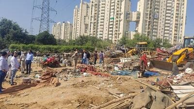 The demolition drive on Golf Course Extension Road near Gurugram Sector 50 on Friday. (HT Photo)