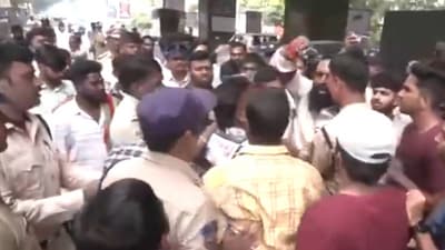 People stage protest at Nampally’s main road over the damage to goddess Durga idol. (ANI/video screengrab)