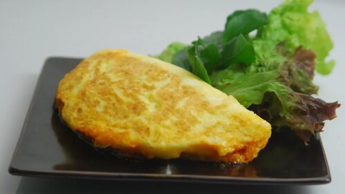 Keema omelette is a flavourful fusion of spiced minced meat (keema) folded into a fluffy omelette. (Sanjeev Kapoor) Keema omelette is a flavourful fusion of spiced minced meat (keema) folded into a fluffy omelette. (Sanjeev Kapoor)