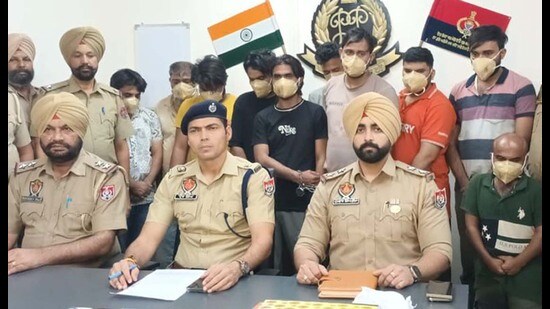 Fraud accused in police custody in Dugri, Ludhiana, on Friday. (HT photo)