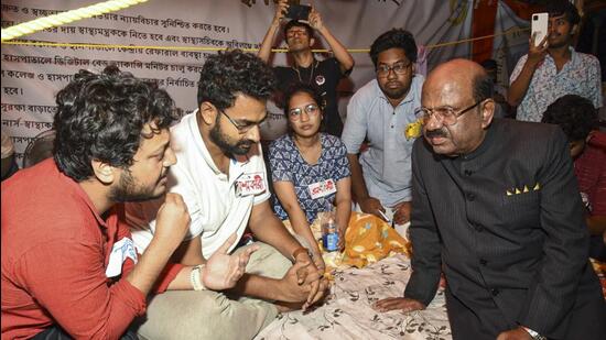 West Bengal governor C V Ananda Bose with junior doctors. (PTI)