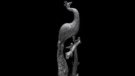 Prime Minister Narendra Modi gifts a Silver Nakkashi work peacock figurine to PM of Japan, Shigeru Ishiba, in Vientiane on Friday. This exquisite silver peacock sculpture has been adorned with intricate nakkashi (carving) work, originating from West Bengal, India. The craftsmanship is a hallmark of traditional metal artistry, combining precise detailing and cultural symbolism, reflecting the artistic heritage of the region.