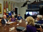 President Joe Biden, from left, joined by Energy Secretary Jennifer Granholm, White House climate adviser Ali Zaidi, and on screen from left, FEMA Administrator Deanne Criswell and Vice President Kamala Harris, speaks about the federal government's response to Hurricanes Milton and Helene. (AP Photo/Manuel Balce Ceneta) President Joe Biden, from left, joined by Energy Secretary Jennifer Granholm, White House climate adviser Ali Zaidi, and on screen from left, FEMA Administrator Deanne Criswell and Vice President Kamala Harris, speaks about the federal government's response to Hurricanes Milton and Helene. (AP Photo/Manuel Balce Ceneta)