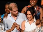 Colombia's Vice President Francia Marquez (2nd R) greets Colombia's former Education Minister Aurora Vergara (2nd L) next to Britain's Prince Harry (C), Duke of Sussex, and his wife Meghan Markle during a picture 