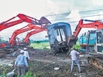 Cranes lift the wrecked coaches as track restoration works begins after 12 coaches of Mysuru-Darbhanga Bagmati Superfast Express derailed by colliding with a stationary goods train at Chennai-Guddur section between Ponneri- Kavarappettai railway stations, on Saturday. At least 19 passengers were injured in the incident. (ANI)