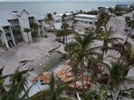 Debris lies scattered on Manasota Key, Fla., following the passage of Hurricane Milton, Friday, Oct. 11, 2024. (AP Photo/Rebecca Blackwell) Debris lies scattered on Manasota Key, Fla., following the passage of Hurricane Milton, Friday, Oct. 11, 2024. (AP Photo/Rebecca Blackwell)