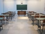 A viral video of a teacher making students give her a massage has left people angry. (Unsplash/ivalex)
