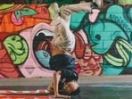 Years of performing headspins can have a significant side effect.
