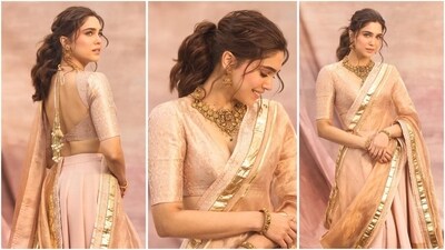 Sharvari Wagh is here to give you some stunning ethnic fashion inspiration for the festive season. In her latest look, the Munjya actor is seen looking glamorous in a light pink and gold lehenga ensemble. (Instagram/@sharvari) Sharvari Wagh is here to give you some stunning ethnic fashion inspiration for the festive season. In her latest look, the Munjya actor is seen looking glamorous in a light pink and gold lehenga ensemble. (Instagram/@sharvari)