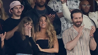 Taylor Swift, Blake Lively, Ryan Reynolds, Hugh Jackman react during the match on Sunday. (AP) Taylor Swift, Blake Lively, Ryan Reynolds, Hugh Jackman react during the match on Sunday. (AP)