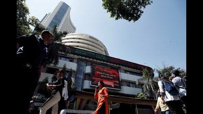 FILE PHOTO: People walk past the Bombay Stock Exchange (BSE) building in Mumbai, India, March 9, 2020. REUTERS/Francis Mascarenhas/File Photo (REUTERS) FILE PHOTO: People walk past the Bombay Stock Exchange (BSE) building in Mumbai, India, March 9, 2020. REUTERS/Francis Mascarenhas/File Photo (REUTERS)