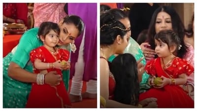 Bipasha Basu with little Devi at a Durga puja pandal in Mumbai. Bipasha Basu with little Devi at a Durga puja pandal in Mumbai.