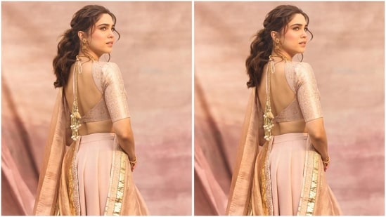 Her makeup look features nude eyeshadow, winged eyeliner, defined brows, mascara-coated lashes, blushed cheeks, luminous highlighter, and nude lipstick. With her curly tresses styled in a messy ponytail, she finished off her look.(Instagram/@sharvari)