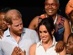 Colombia's Vice President Francia Marquez (2nd R) greets Colombia's former Education Minister Aurora Vergara (2nd L) next to Britain's Prince Harry (C), Duke of Sussex, and his wife Meghan Markle during a picture 