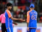 India's Mayank Yadav (L) celebrates with captain Suryakumar Yadav after taking a wicket. India's Mayank Yadav (L) celebrates with captain Suryakumar Yadav after taking a wicket.