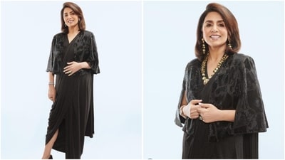 In another saree look, Neetu Kapoor shows how to slay black with style, donning a side-slit saree paired with an embellished blouse. She accessorised the look with a statement gold necklace and earrings, looking absolutely stunning. (Instagram/@neetu54) In another saree look, Neetu Kapoor shows how to slay black with style, donning a side-slit saree paired with an embellished blouse. She accessorised the look with a statement gold necklace and earrings, looking absolutely stunning. (Instagram/@neetu54)