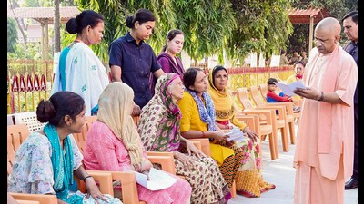 Chief minister Yogi Adityanath interacts with people during Janta Darshan programme, on Gorakhnath Temple campus in Gorakhpur on Sunday. (ANI Photo) (Yogi Adityanath Office-X/ANI)