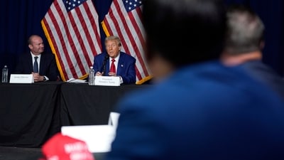 Republican presidential nominee former President Donald Trump participates in a roundtable with Sen. Mike Lee, R-Utah, Sunday, Oct. 13, 2024, in Prescott Valley. Ariz (AP Photo/Evan Vucci) Republican presidential nominee former President Donald Trump participates in a roundtable with Sen. Mike Lee, R-Utah, Sunday, Oct. 13, 2024, in Prescott Valley. Ariz (AP Photo/Evan Vucci)