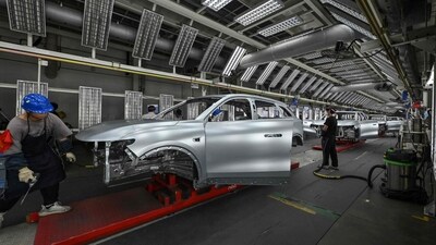 Employees work on an electric vehicle (EV) production line at the Leapmotor factory in Jinhua, China's eastern Zhejiang province on September 18, 2024. china's Leapmotor and Stellantis are set to start taking orders in Europe for the T03 electric city car, the group announced on September 24, 2024. (Adek Berry/AFP) Employees work on an electric vehicle (EV) production line at the Leapmotor factory in Jinhua, China's eastern Zhejiang province on September 18, 2024. china's Leapmotor and Stellantis are set to start taking orders in Europe for the T03 electric city car, the group announced on September 24, 2024. (Adek Berry/AFP)