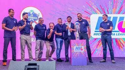 HI president Dilip Tirkey (with paddle) at the Hockey India League auction held in New Delhi on Sunday. (Hockey India Photo) HI president Dilip Tirkey (with paddle) at the Hockey India League auction held in New Delhi on Sunday. (Hockey India Photo)