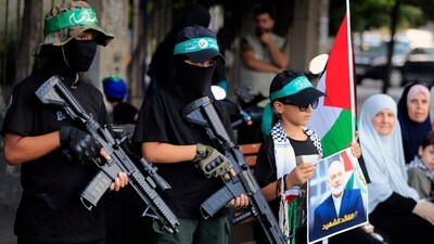 Militant group Hamas was originally planning to attack Israel in 2022, the report said. (AP) Militant group Hamas was originally planning to attack Israel in 2022, the report said. (AP)