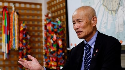 Japan Confederation of A- and H-Bomb Sufferers Organizations (Nihon Hidankyo) co-chair Toshiyuki Mimaki, who survived the 1945 atomic bombing of Hiroshima, gestures as he speaks during an interview with Reuters on the following day of Nihon Hidankyo winning the 2024 Nobel Peace Prize, in Hiroshima, western Japan, October 12, 2024.  REUTERS/Kim Kyung-Hoon (REUTERS)