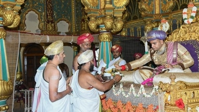 Scion of the Mysore royal family Yaduveer Krishnadatta Chamaraja Wadiyar holds a private durbar on the first day of 'Navratri' celebrations, at Mysuru Palace. (PTI) Scion of the Mysore royal family Yaduveer Krishnadatta Chamaraja Wadiyar holds a private durbar on the first day of 'Navratri' celebrations, at Mysuru Palace. (PTI)