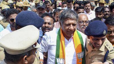 Police detain Hubli-Dharwad West MLA Arvind Bellad during a BJP protest against CM Siddaramaiah in Hubballi on Sunday. (PTI) Police detain Hubli-Dharwad West MLA Arvind Bellad during a BJP protest against CM Siddaramaiah in Hubballi on Sunday. (PTI)