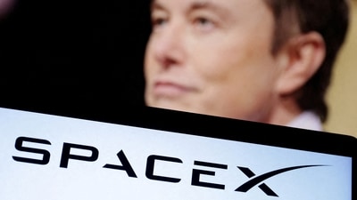 SpaceX logo and Elon Musk photo are seen in this illustration. (Reuters)