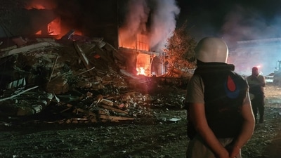 A person stands by damages at the site of an Israeli airstrike that targeted the southern Lebanese city of Nabatiyeh on October 12, 2024. (AFP) A person stands by damages at the site of an Israeli airstrike that targeted the southern Lebanese city of Nabatiyeh on October 12, 2024. (AFP)