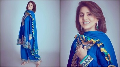 In another ethnic look, she rocked a blue loose-fit kurta with golden embroidery, paired with palazzo pants and a frilled dupatta. She truly nailed the look. (Instagram/@neetu54) In another ethnic look, she rocked a blue loose-fit kurta with golden embroidery, paired with palazzo pants and a frilled dupatta. She truly nailed the look. (Instagram/@neetu54)