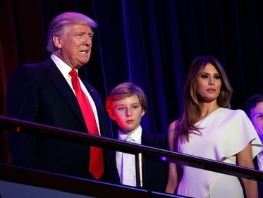 President-elect Donald Trump, left, arrives to speak at an election night rally with his son Barron and wife Melania, in New York, Nov. 9, 2016. (AP) President-elect Donald Trump, left, arrives to speak at an election night rally with his son Barron and wife Melania, in New York, Nov. 9, 2016. (AP)