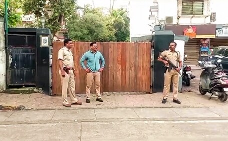 Security personnel stand guard near Bollywood actor Salman Khan's residence after former Maharashtra minister Baba Siddique was shot dead on Saturday, in Mumbai, Sunday, Oct. 13, 2024. (PTI) Security personnel stand guard near Bollywood actor Salman Khan's residence after former Maharashtra minister Baba Siddique was shot dead on Saturday, in Mumbai, Sunday, Oct. 13, 2024. (PTI)