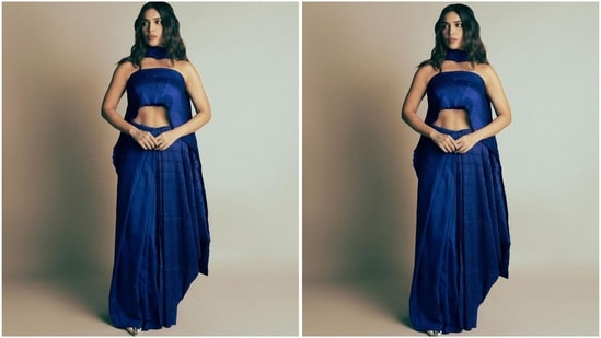 In the post, Bhumi can be seen donning a mesmerising blue saree from the shelves of the brand Label Shimona Agrawal.(Instagram/@bhumipednekar)