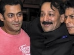 **EDS: FILE IMAGE** Mumbai: In this Sunday, July 21, 2013 file photo, then Congress leader Baba Siddique with actors Salman Khan and Shah Rukh Khan during an Iftar party, in Mumbai. Three unidentified persons fired at and injured Baba Siddiqui of the Ajit Pawar-led NCP in Mumbai's Bandra East on Saturday evening. (PTI Photo) (PTI10_12_2024_000458A) (PTI)