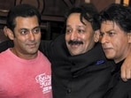 Baba Siddique with actors Salman Khan and Shah Rukh Khan during an Iftar party, in Mumbai. Baba Siddique with actors Salman Khan and Shah Rukh Khan during an Iftar party, in Mumbai.