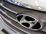 The logo of Hyundai Motor is seen on a car displayed at a Hyundai dealership in Seoul.