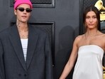 (FILES) Justin and Hailey Bieber are hesitant about involving her parents in their lives.
 (Photo by ANGELA  WEISS / AFP)