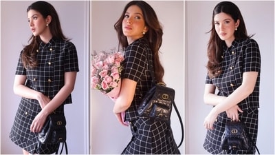 Shanaya Kapoor exudes grace in a black and white plaid shirt and mini skirt ensemble. Paired with pearl stud earrings and a Gucci bag, she perfectly finishes off her chic look. (Instagram) Shanaya Kapoor exudes grace in a black and white plaid shirt and mini skirt ensemble. Paired with pearl stud earrings and a Gucci bag, she perfectly finishes off her chic look. (Instagram)