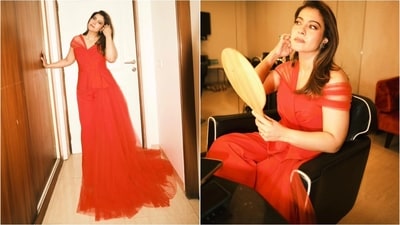 Kajol shows how to style red with flair in a striking Gauri and Nainika bright red jumpsuit, featuring a peplum design and a tulle side train. (Instagram) Kajol shows how to style red with flair in a striking Gauri and Nainika bright red jumpsuit, featuring a peplum design and a tulle side train. (Instagram)