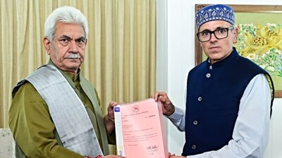 Jammu and Kashmir National Conference Vice President Omar Abdullah meets LG Manoj Sinha to stake claim to form the government, at Rajbhawan in Srinagar on Friday. (JKNC - X)