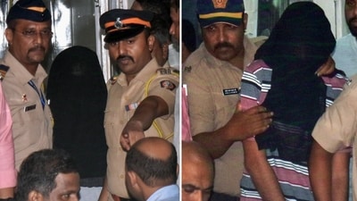 Police personnel escort the two accused identified as Gurmail Singh and Dharamraj Kashyap to Esplanade Court (Deepak Salvi) Police personnel escort the two accused identified as Gurmail Singh and Dharamraj Kashyap to Esplanade Court (Deepak Salvi)