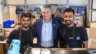 Australia's Assistant Minister for Immigration Matt Thistlethwaite poses for a photo with staff members of Blue Tokai Coffee Roasters during his visit to Khan Market, in New Delhi on Monday. (Amit Sharma/ANI) Australia's Assistant Minister for Immigration Matt Thistlethwaite poses for a photo with staff members of Blue Tokai Coffee Roasters during his visit to Khan Market, in New Delhi on Monday. (Amit Sharma/ANI)