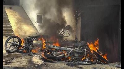 Bikes burnt following Sunday night violence during Durga idol immersion in Bahraich. (PTI Photo)