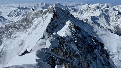 (FILES) This picture taken on May 31, 2021 shows peaks along the Himalayan range, as seen from the summit of Mount Everest. (Photo by Lakpa SHERPA / AFP) (AFP) (FILES) This picture taken on May 31, 2021 shows peaks along the Himalayan range, as seen from the summit of Mount Everest. (Photo by Lakpa SHERPA / AFP) (AFP)