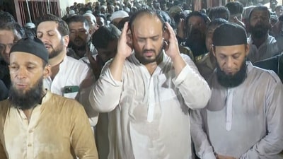 Mumbai: Congress MLA Zeeshan Siddique (C) offers prayers before the mortal remains of his father and former Maharashtra minister, Baba Siddique, were taken for burial. (PTI) Mumbai: Congress MLA Zeeshan Siddique (C) offers prayers before the mortal remains of his father and former Maharashtra minister, Baba Siddique, were taken for burial. (PTI)