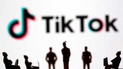 The job reductions at TikTok aim to enhance content moderation, with plans to invest $2 billion in trust and safety in 2024. (Reuters)
