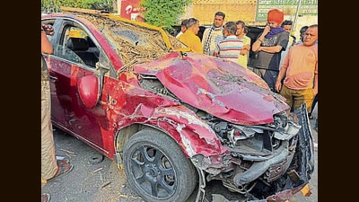 The mangled remains of the car after the accident at Ajouli toll barrier in Una district on Monday. (HT Photo)
